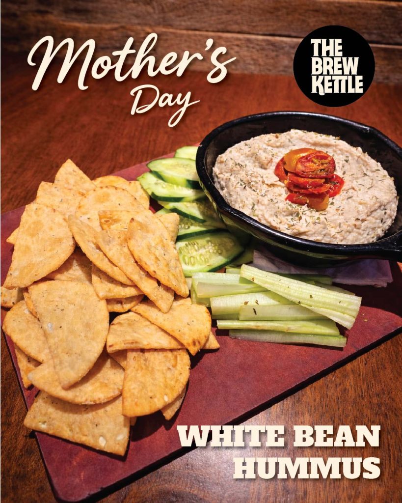 White bean hummus with chips and vegetables